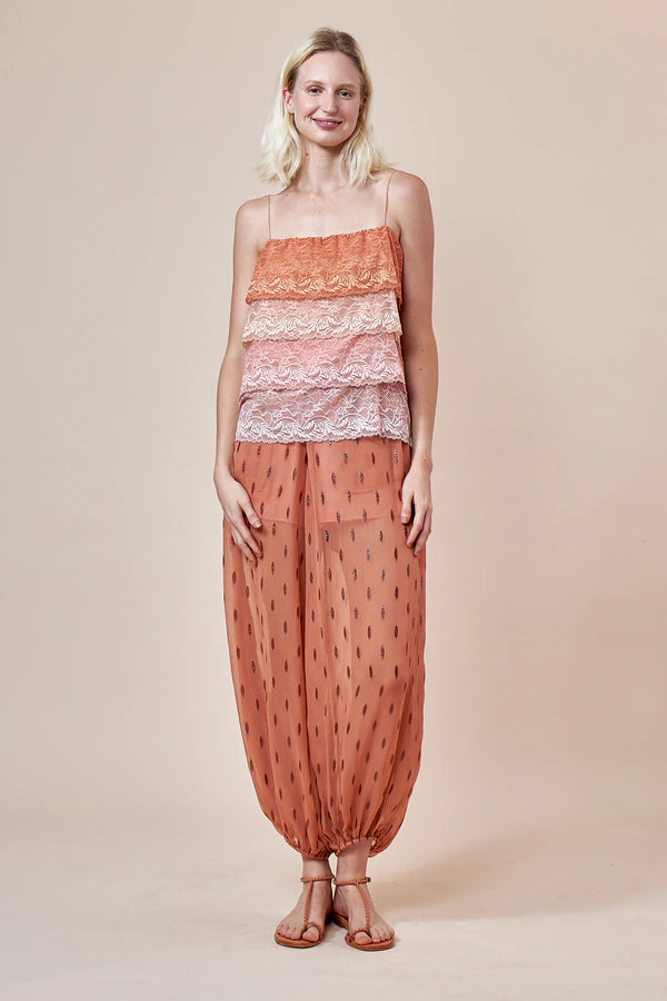 blusa alcançar