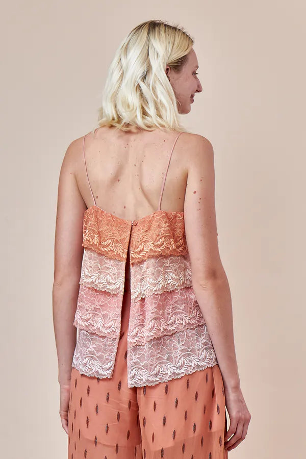 blusa alcançar